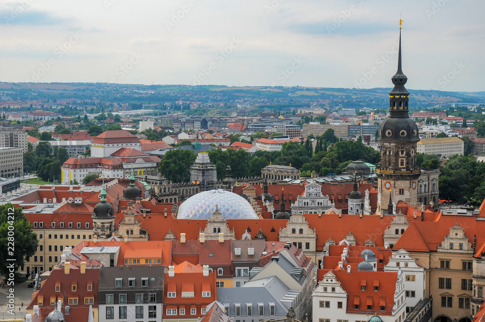 Scenic aerial view of rooftops in Dresden, Germany with tower of Saxony Dresden Castle
