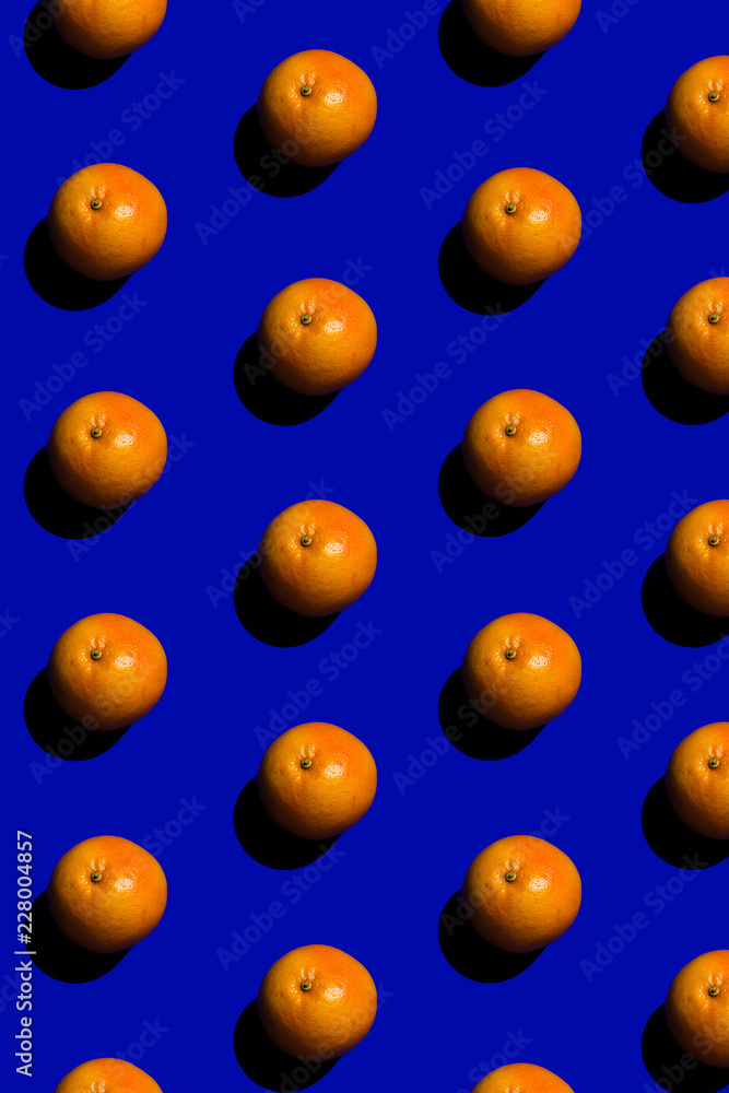 Rows of grapefruits on the blue background Rows of grapefruits on the blue background