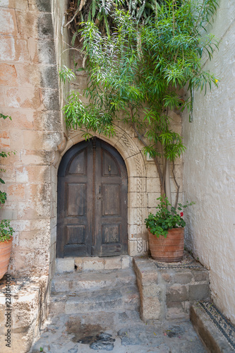 Old door in Lindos Town. Greek Island of Rhodes. 