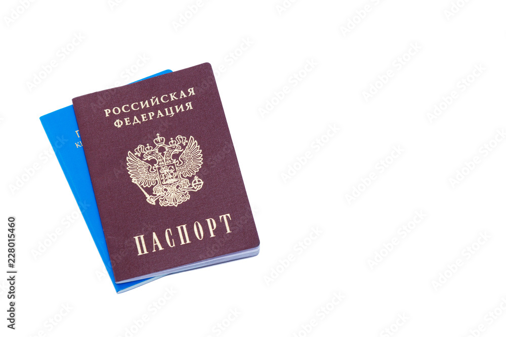 Russian passport lying on top of the passport of Kyrgyzstan change of nationality