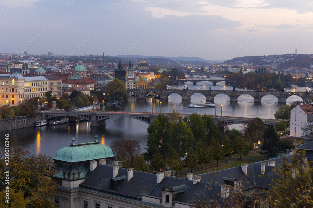 Fototapeta premium Night Prague City with its Cathedrals, Towers and Bridges, Czech Republic