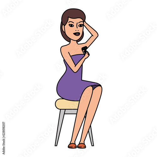 woman in towel waxing armpit with razor blade