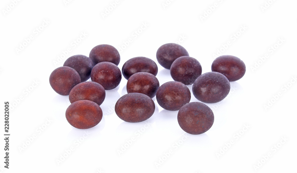 chocolate covered coffee beans on white background chocolate covered coffee beans on white background