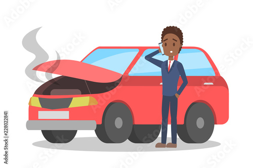 Man standing at the broken car and calling
