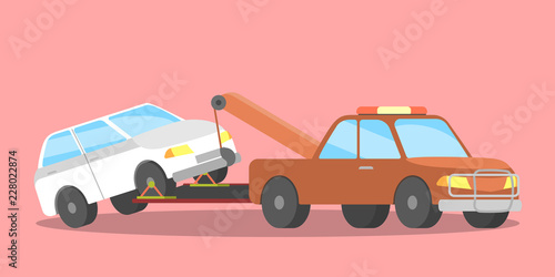 Broken white car on the tow truck