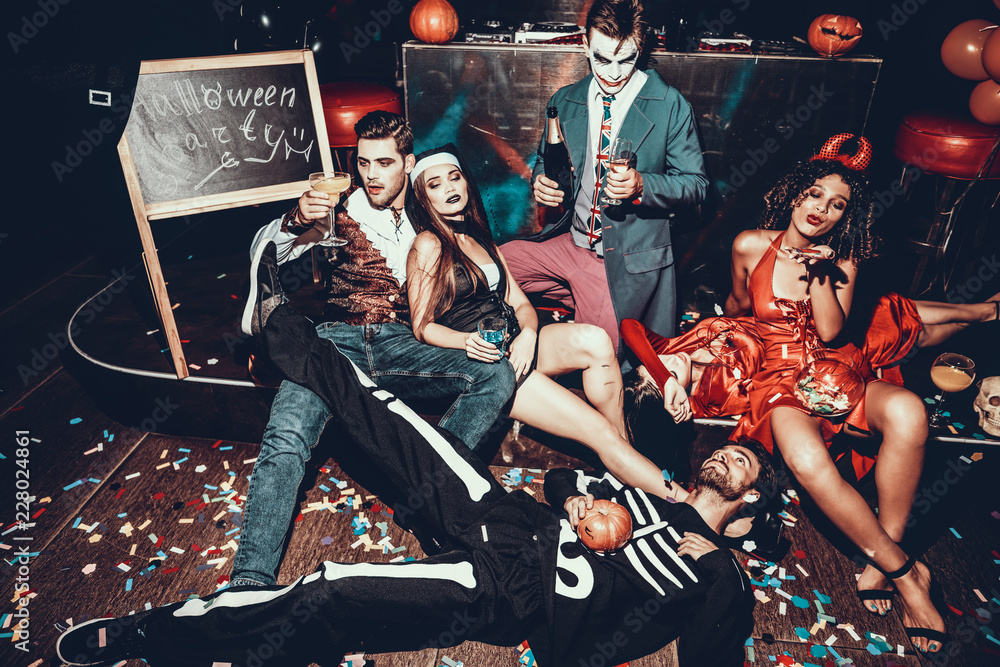 Αυτοκόλλητο Drunk Young People in Costumes Resting after Party