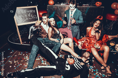 Photography Drunk Young People in Costumes Resting after Party