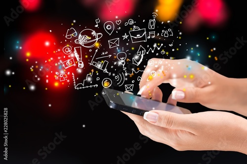 Woman hands holding smartphone isolated on background