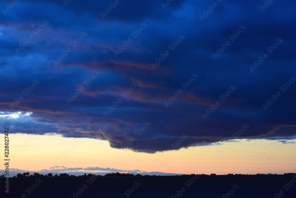 Dark cloud at dusk