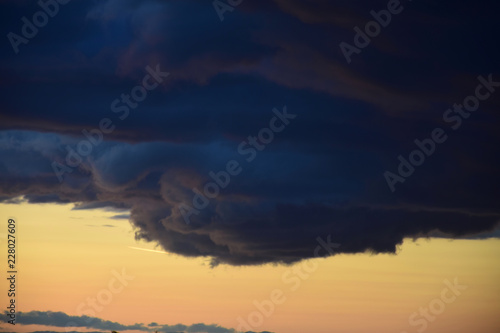 Dark cloud formation at dusk