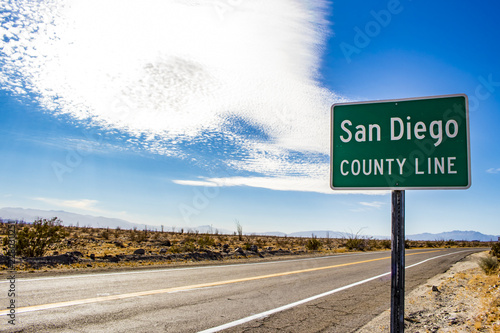 San Diego County Line Highway Sign in the Anza Borrego Desert State Park in California, USA photo