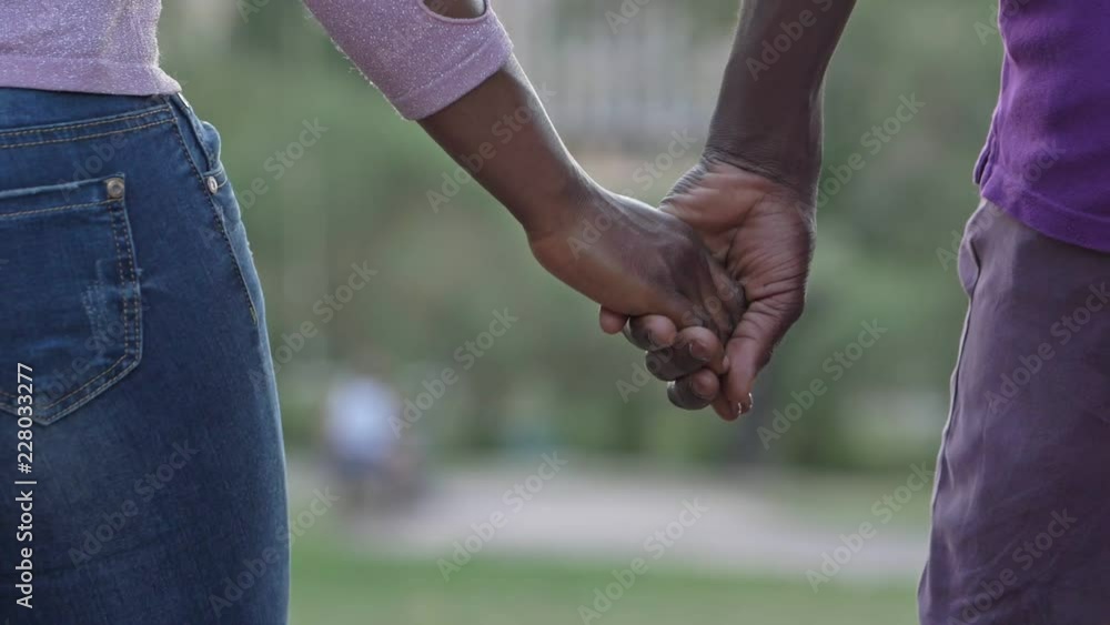 love,affection, romance. black couple hands holding-slow motion love,affection, romance. black couple hands holding-slow motion
