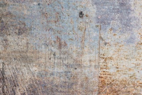 Grey scratched rusty metal background
