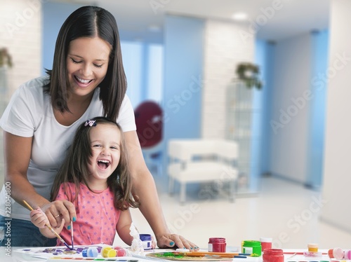 Happy family kid mom babysitter parent teacher