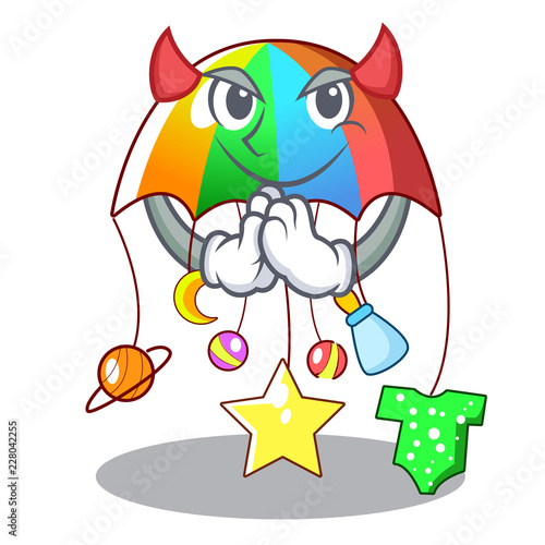 Devil baby sleeping with cartoon hanging toys