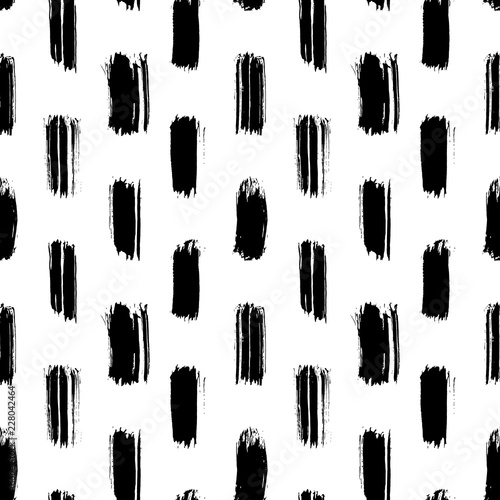 Seamless pattern with black vertical hand-drawn ink brush stripes and strokes isolated on white background. Rough shapes vector backdrop. Doodle style abstract grunge texture.