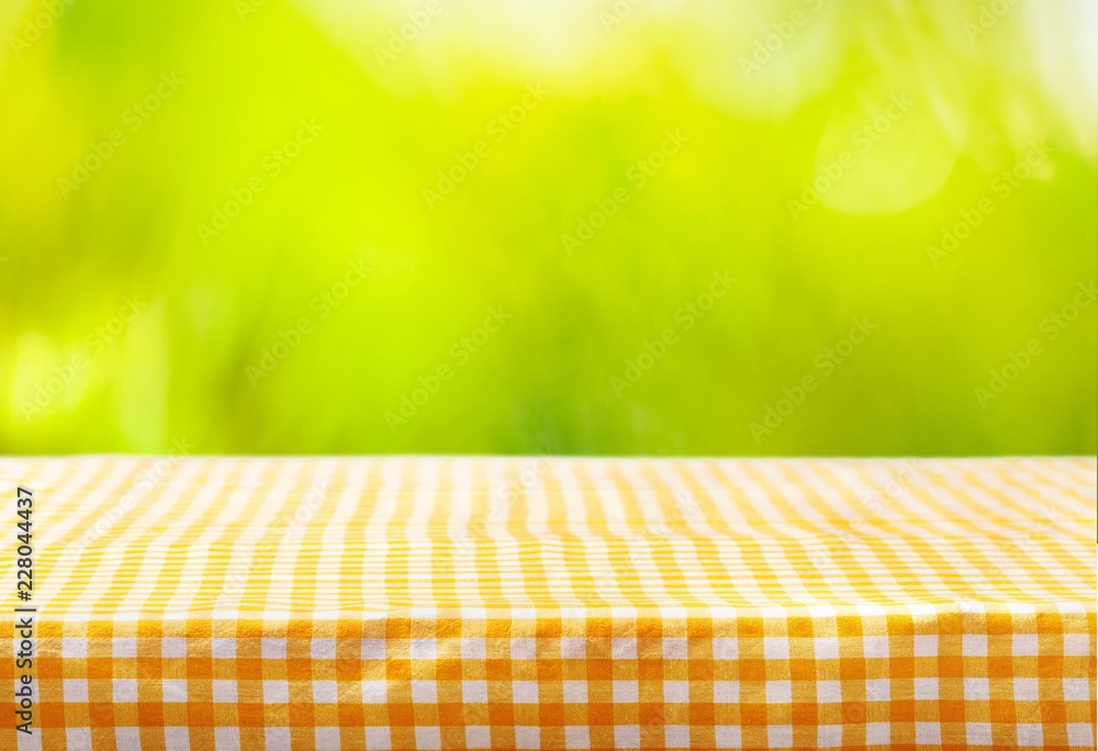 Orange cloth napkin on bokeh background