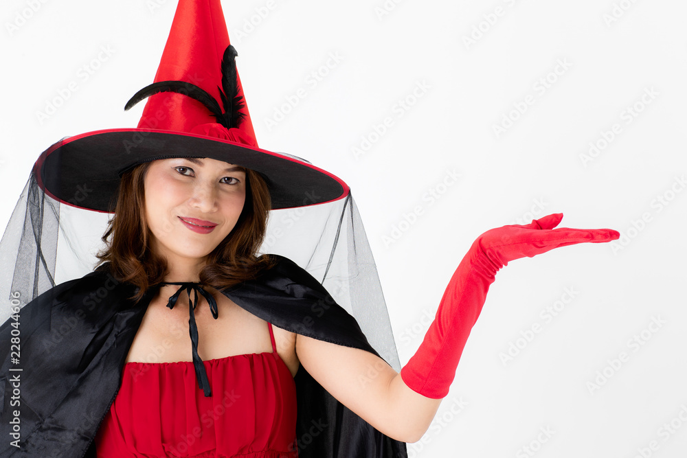 Woman in red costume look like female witch raising left hand look like ...