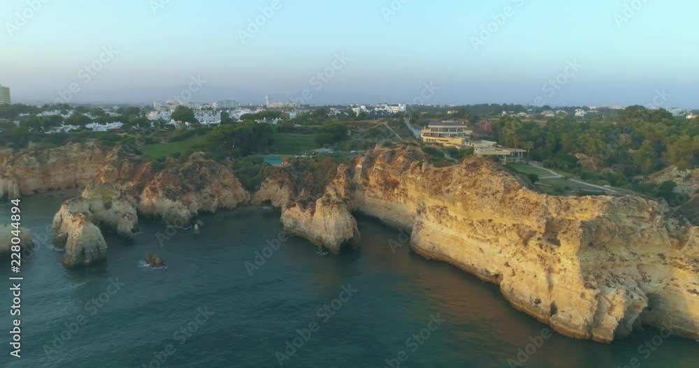 Aerial view of the beautiful Praia da Prainha beach in Alvor, famous tourist destination in Western Algarve Coast, Portugal. Aerial view of the beautiful Praia da Prainha beach in Alvor, famous tourist destination in Western Algarve Coast, Portugal.