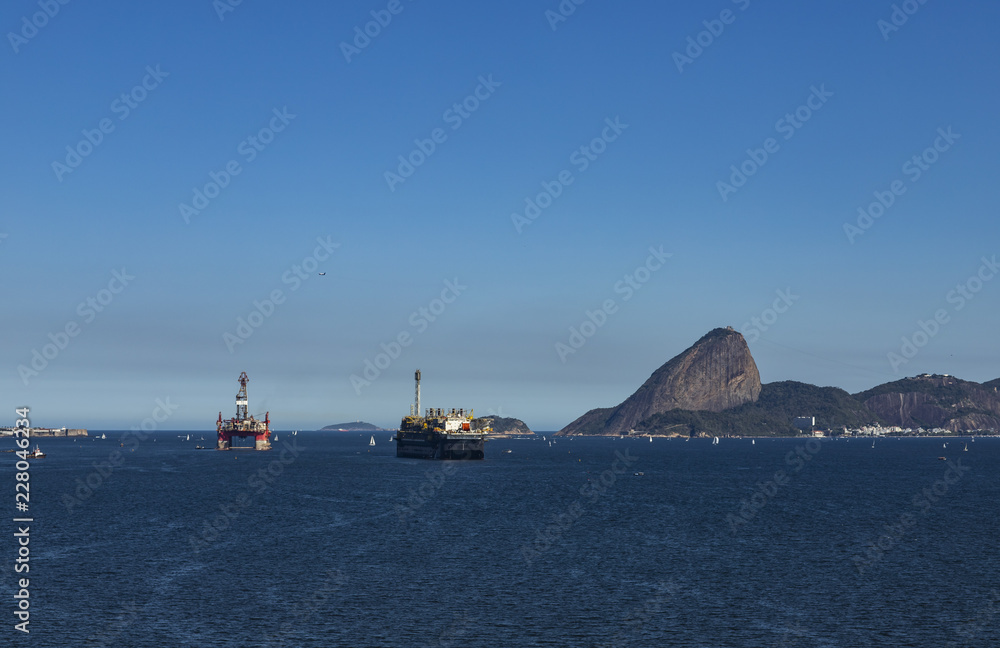 Wonderful city, Rio de Janeiro and the Sugar Loaf mountain in the background, Brazil, South America. Oil and gas ship. Offshore oil industry. Copy space for advertising, to insert text or slogan.