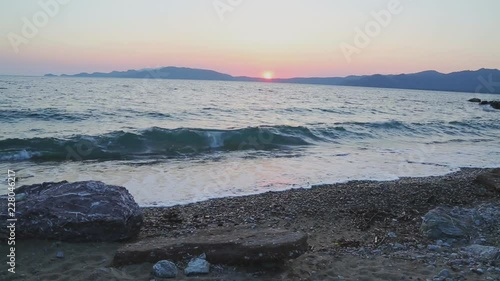 Beautiful waves of mediterranean sea during sunset near hisaronu, marmaris
