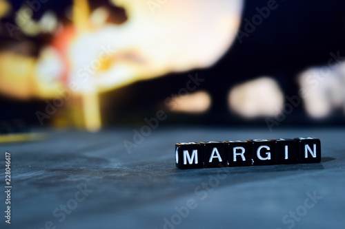 Margin on wooden blocks. Cross processed image with bokeh background