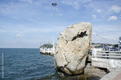 Big stone in the sea at Laem Thaen Cape in Chonburi, Thailand