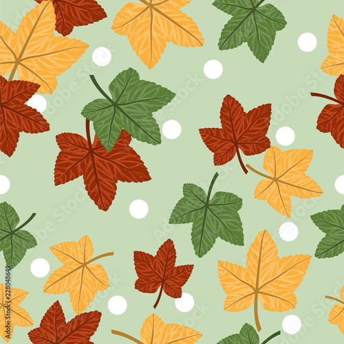 Vector floral seamless pattern with autumn leaves and polka dot.