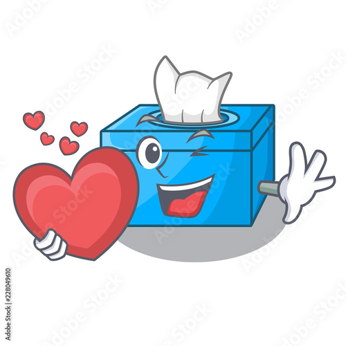 With heart cartoon tissue box on a sideboard
