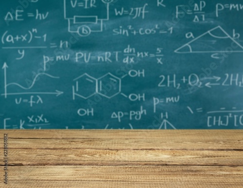 Molecule models and formulas on blackboard background