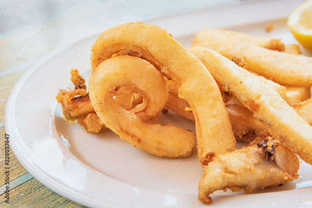 The breaded and fried squid, typical dish of the Canary Islands, Spain The breaded and fried squid, typical dish of the Canary Islands, Spain