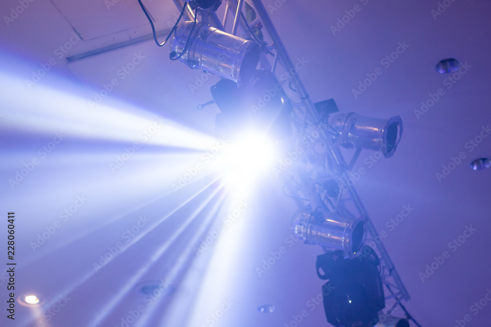 spotlight . set of hanging light . project beam glowing light . spotlight . set of hanging light . project beam glowing light .