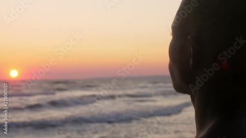 Wallpaper Mural black african man 's silhouette contemplating ocean at sunset - back view Torontodigital.ca