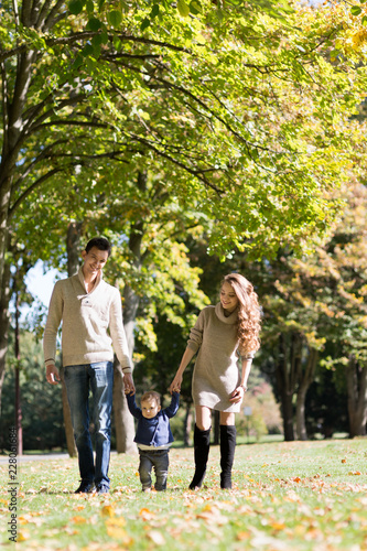 family with a baby in autumn park