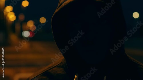 Wallpaper Mural Mysterious man alone with hood in the city at night.crime, fear - No face Torontodigital.ca