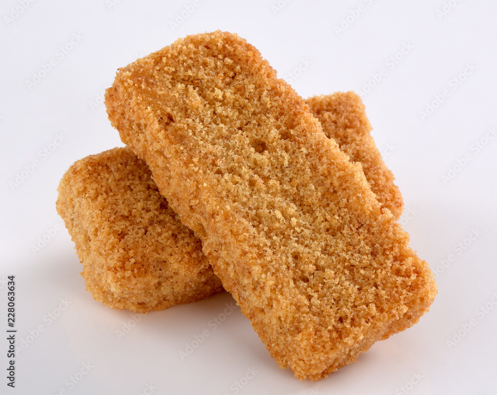Cake Rusk, Crunchy, crispy dry cake biscuit, also known as cake toast. Cake Rusk, Crunchy, crispy dry cake biscuit, also known as cake toast.