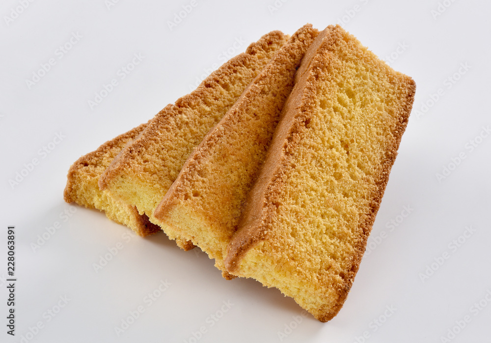 Cake Rusk, Crunchy, crispy dry cake biscuit, also known as cake toast. Cake Rusk, Crunchy, crispy dry cake biscuit, also known as cake toast.