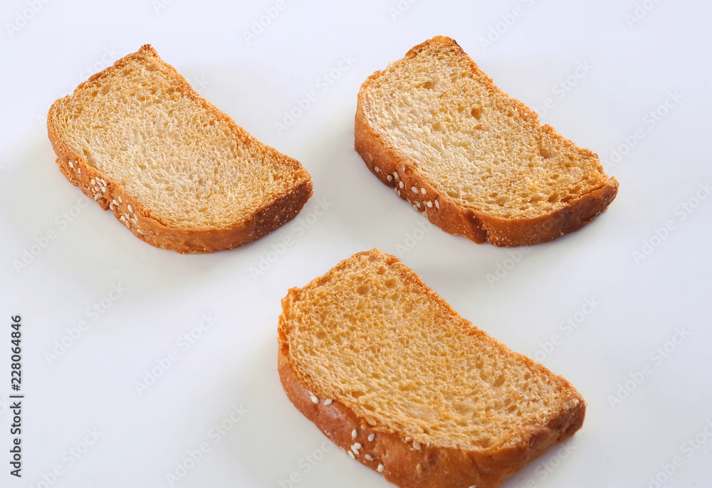 Tea Rusk, Crunchy, crispy dry biscuit, a famous breakfast snack. It is also known as twice-baked bread. Tea Rusk, Crunchy, crispy dry biscuit, a famous breakfast snack. It is also known as twice-baked bread.