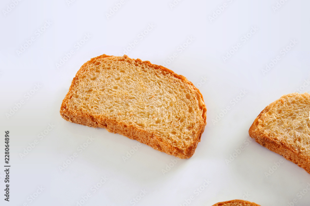 Tea Rusk, Crunchy, crispy dry biscuit, a famous breakfast snack. It is also known as twice-baked bread. Tea Rusk, Crunchy, crispy dry biscuit, a famous breakfast snack. It is also known as twice-baked bread.