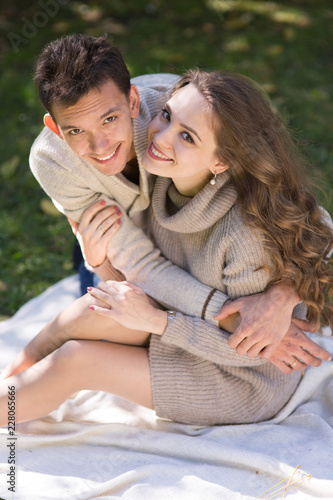 Young couple in autumn park © Evgenia Tiplyashina