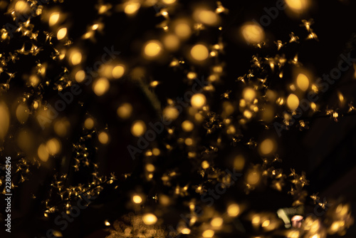 Golden Christmas lights on black background
