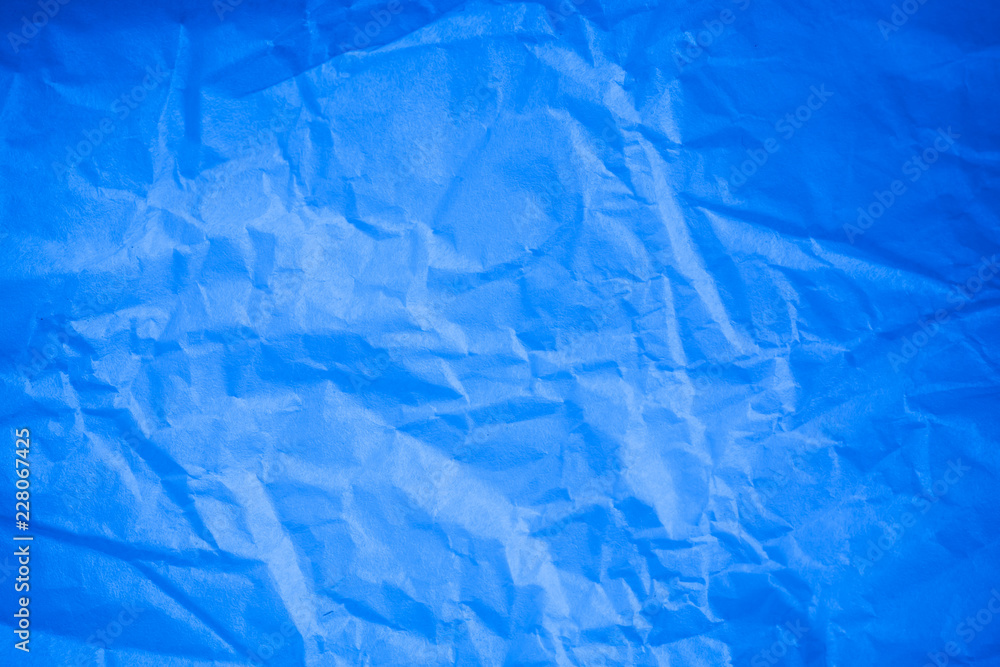 Crumpled blue paper background. Crumpled blue paper background.