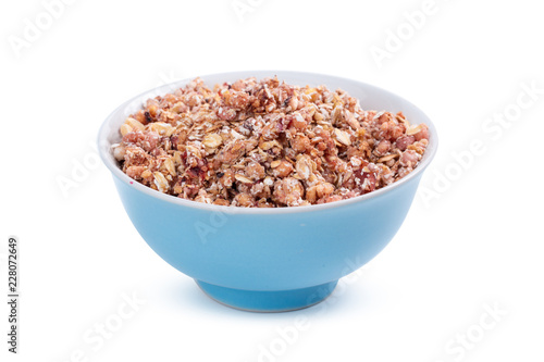 Bowl of granola breakfast isolated on white background