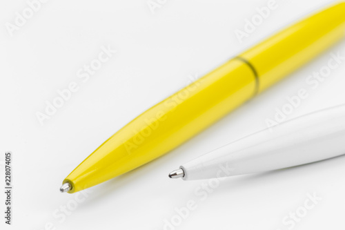 Pens on white background