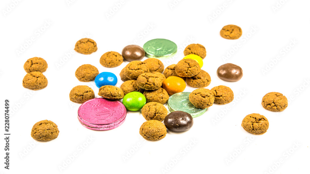 Bunch of pepernoten cookies, sweets and chocolate money frontal view Bunch of pepernoten cookies, sweets and chocolate money frontal view