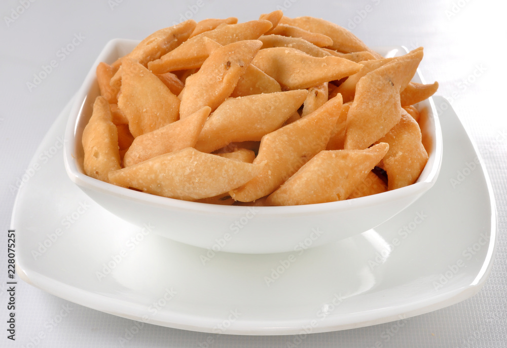 Shakar Para / Namak Para, a popular Indian snack enriched with ...
