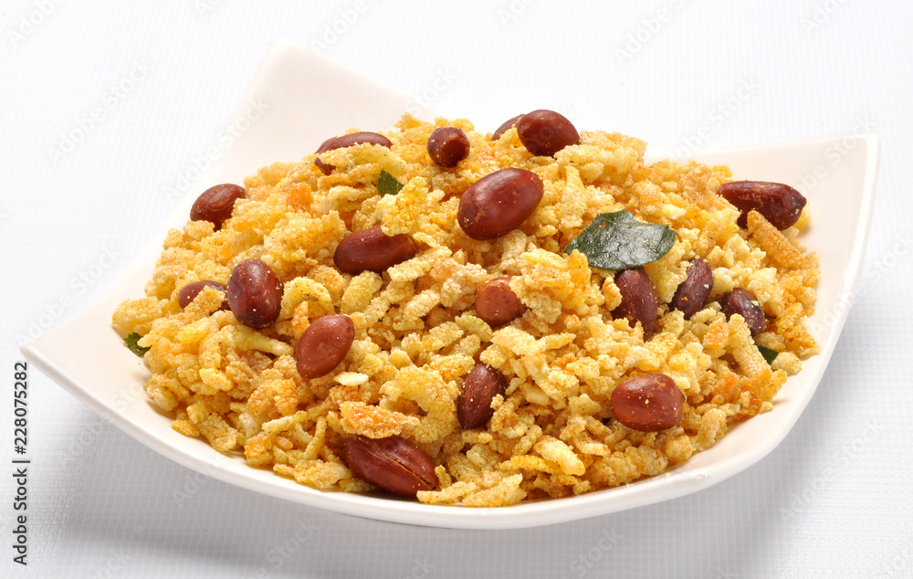 Namkeen Chivda / Namkeen Chewra, A blend of sweet and salty taste of light fried poha with peanuts. Namkeen Chivda / Namkeen Chewra, A blend of sweet and salty taste of light fried poha with peanuts.