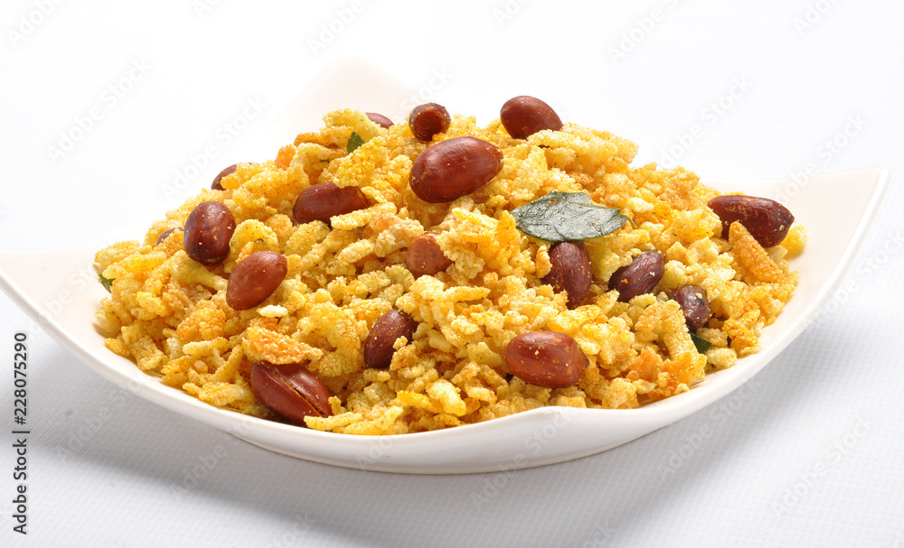 Namkeen Chivda / Namkeen Chewra, A blend of sweet and salty taste of light fried poha with peanuts.