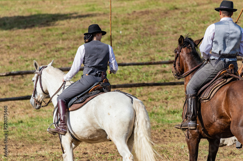 Girl power. Female rider on horse in lovely country ranch. Equestrian lifestyle, huntress, gracefull leadership.