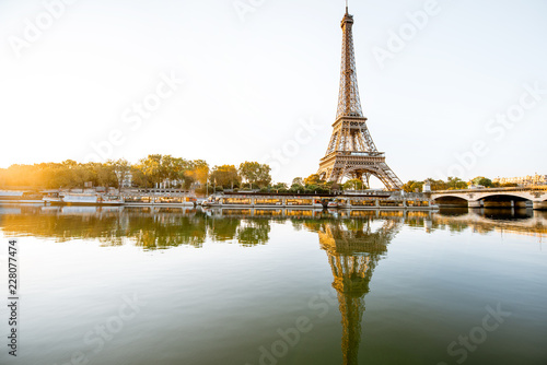 Landscape view of the riverside with Eiffel tower during the morning light in Paris © rh2010